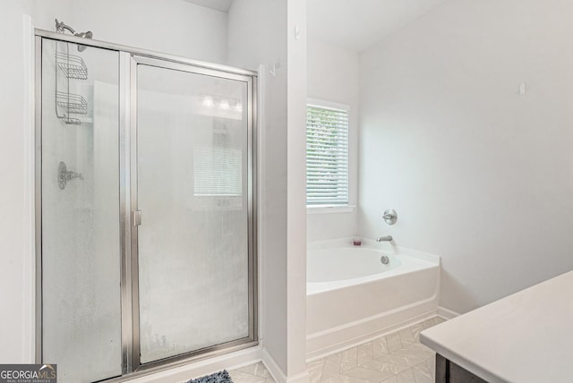 154 Laurel Cove Dr, Hoschton, GA 30548 - full bath featuring a shower stall and a bath
