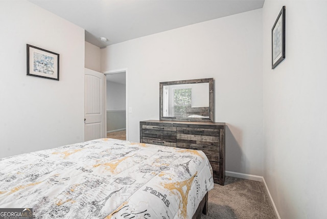 154 Laurel Cove Dr, Hoschton, GA 30548 - carpeted bedroom featuring baseboards