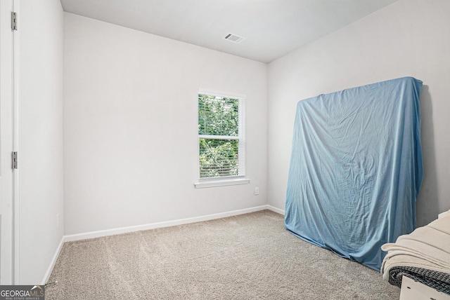 154 Laurel Cove Dr, Hoschton, GA 30548 - carpeted bedroom featuring baseboards