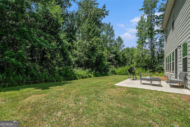 154 Laurel Cove Dr, Hoschton, GA 30548 - view of grassy yard featuring a patio