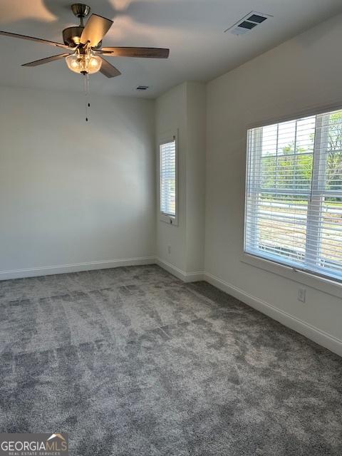 322 Heron St, Ball Ground, GA 30107 - unfurnished room featuring carpet floors and ceiling fan