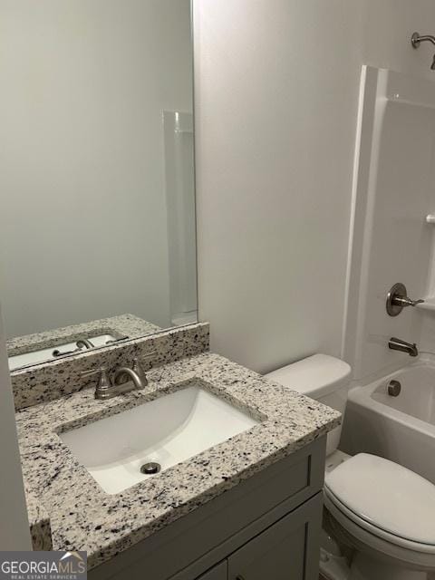 322 Heron St, Ball Ground, GA 30107 - bathroom featuring vanity and shower / bath combination