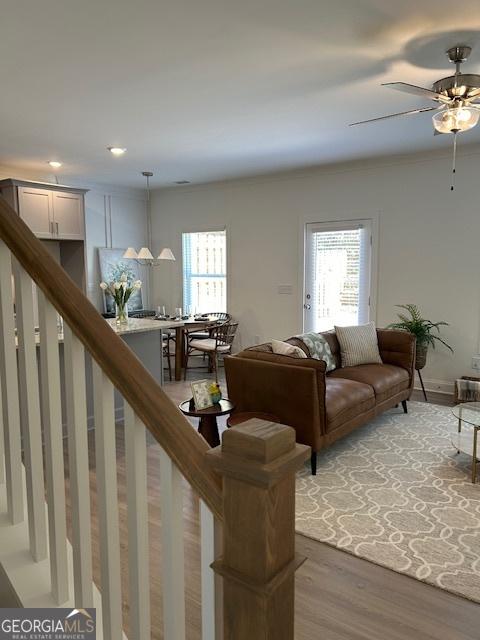 322 Heron St, Ball Ground, GA 30107 - living room featuring light wood-style flooring, a ceiling fan, and recessed lighting