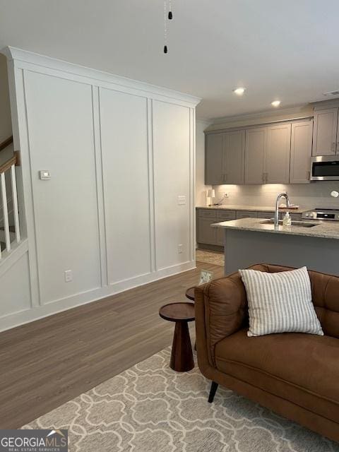 322 Heron St, Ball Ground, GA 30107 - living area with light wood-style flooring, stairway, and recessed lighting