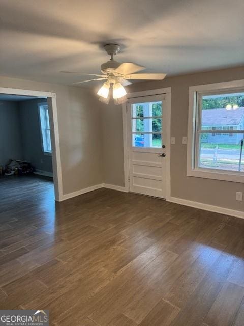 210 Bishop St, Marshallville, GA 31057 - entryway featuring dark wood finished floors and ceiling fan