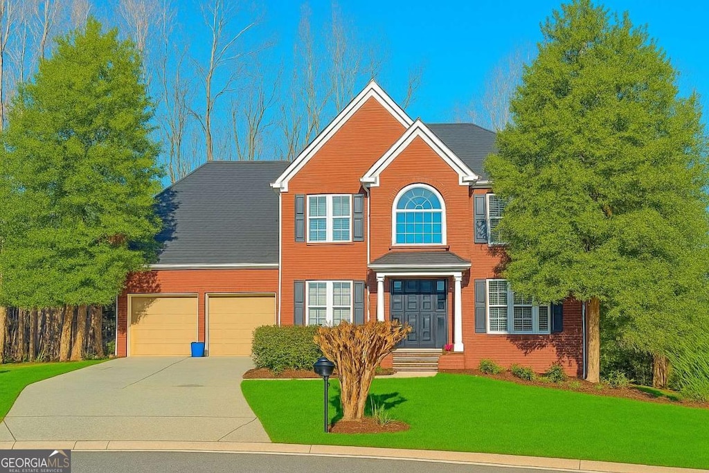 505 Armor Knl, Powder Springs, GA 30127 - view of front of house featuring driveway and a garage