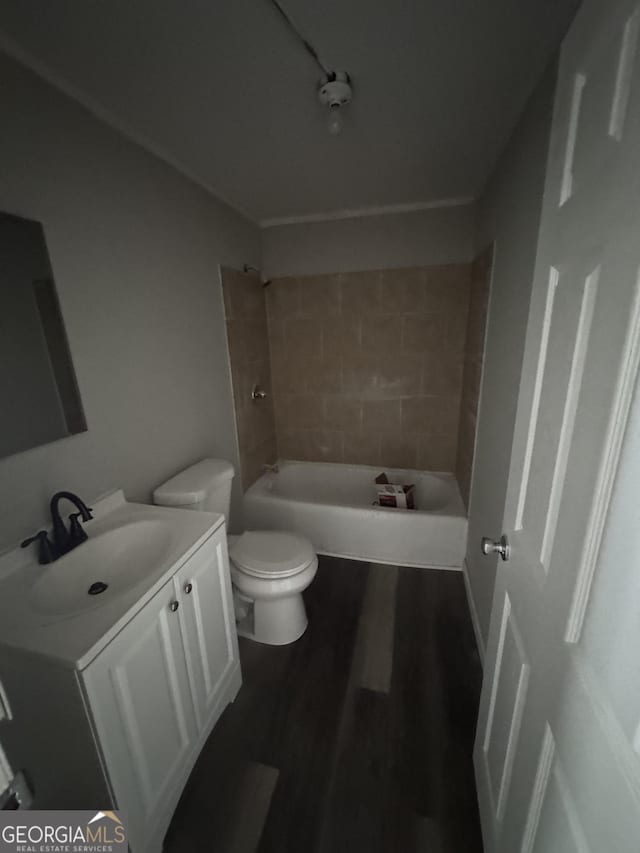 1040 Chestney St, Macon, GA 31217 - bathroom with vanity, wood finished floors, and  shower combination