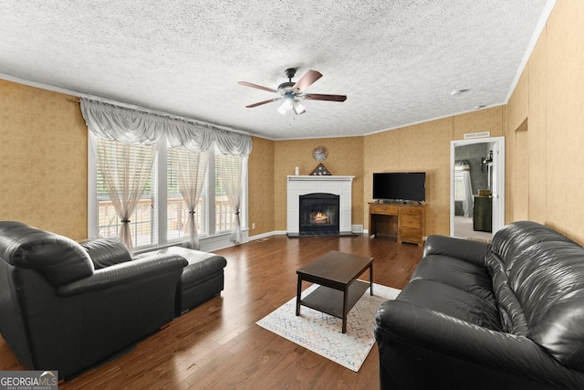 329 Summer Glen Rd, Dahlonega, GA 30533 - living area featuring a ceiling fan, wood finished floors, a textured ceiling, a tile fireplace, and vaulted ceiling