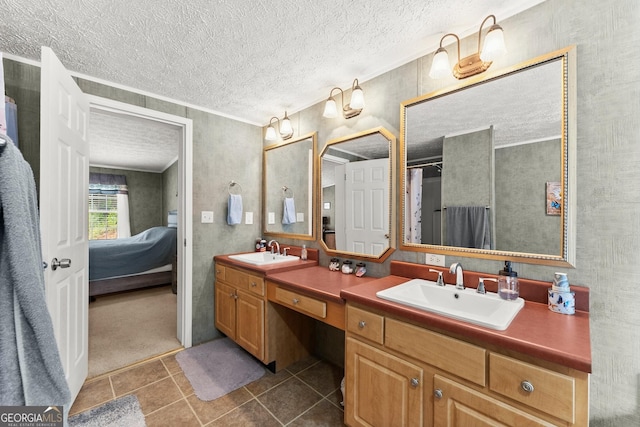 329 Summer Glen Rd, Dahlonega, GA 30533 - bathroom featuring double vanity, connected bathroom, tile patterned flooring, a textured ceiling, and ornamental molding