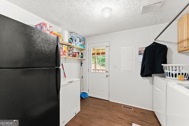 329 Summer Glen Rd, Dahlonega, GA 30533 - washroom featuring washer and dryer, electric panel, dark wood-style flooring, a textured ceiling, and cabinet space