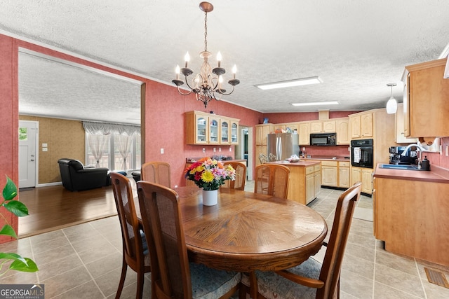 329 Summer Glen Rd, Dahlonega, GA 30533 - dining room with a chandelier, a textured ceiling, and light tile patterned floors