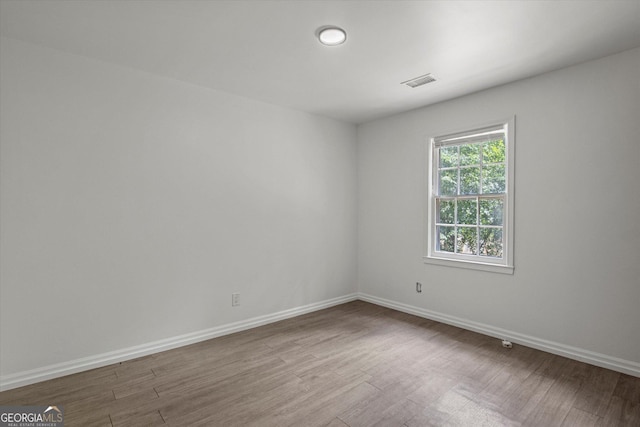 5861 Community Rd SE, Mableton, GA 30126 - unfurnished room featuring wood finished floors