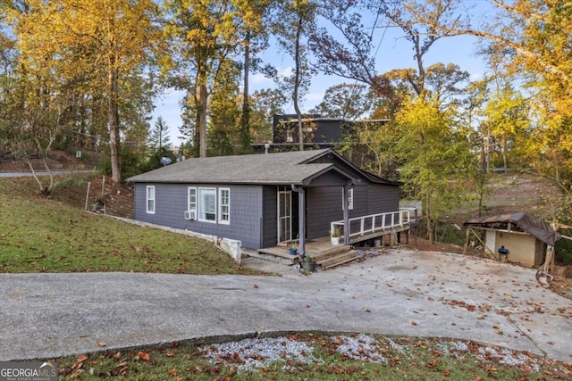 5861 Community Rd SE, Mableton, GA 30126 - view of front of home featuring concrete driveway and a deck