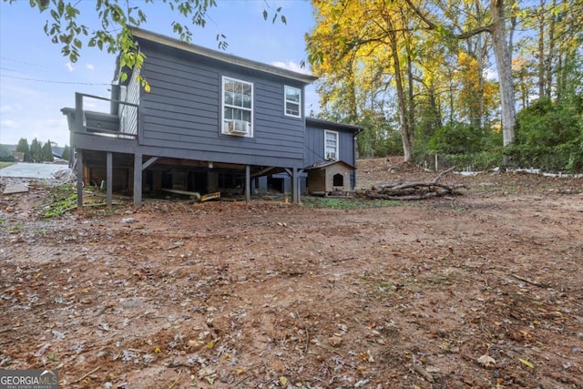 5861 Community Rd SE, Mableton, GA 30126 - back of property featuring a wooden deck and cooling unit