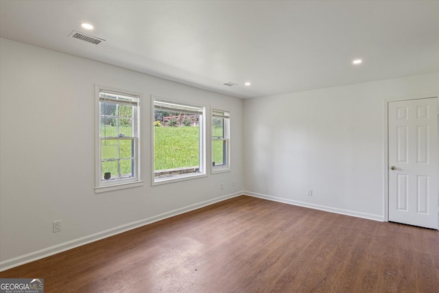 5861 Community Rd SE, Mableton, GA 30126 - spare room with dark wood-style flooring and recessed lighting