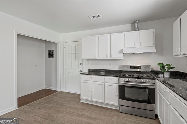 5861 Community Rd SE, Mableton, GA 30126 - kitchen featuring stainless steel gas stove, under cabinet range hood, and white cabinets