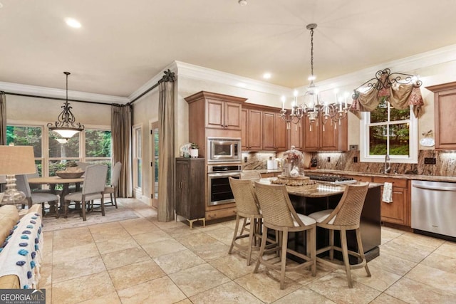 2118 Chatham, Dalton, GA 30720 - kitchen with appliances with stainless steel finishes, crown molding, a chandelier, backsplash, and brown cabinetry