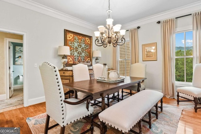 2118 Chatham, Dalton, GA 30720 - dining space with a chandelier, crown molding, light wood finished floors, and plenty of natural light
