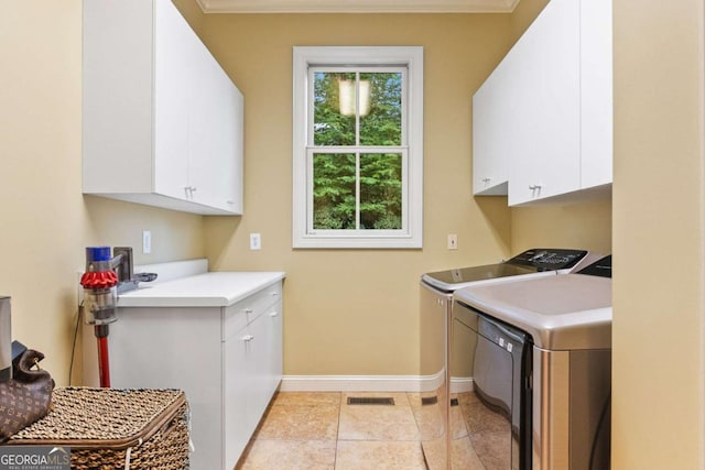 2118 Chatham, Dalton, GA 30720 - laundry room with cabinet space, washer and clothes dryer, and ornamental molding