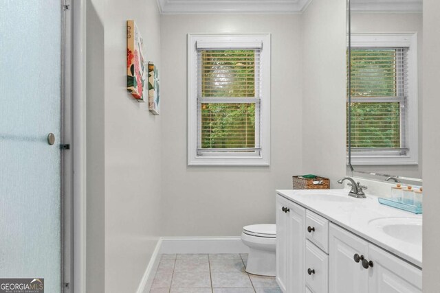 2118 Chatham, Dalton, GA 30720 - bathroom with double vanity, ornamental molding, tile patterned floors, and healthy amount of natural light