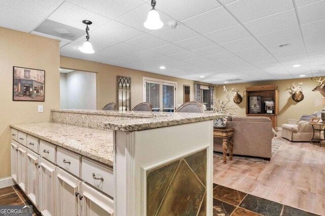 2118 Chatham, Dalton, GA 30720 - kitchen with a peninsula, a paneled ceiling, light stone counters, pendant lighting, and open floor plan