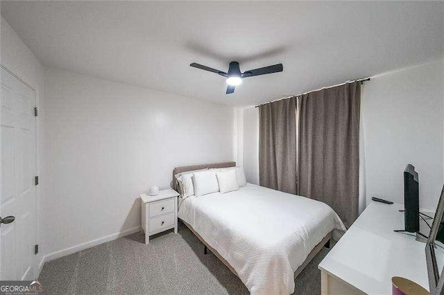 503 Rising Dr, Woodstock, GA 30189 - bedroom with ceiling fan and light carpet