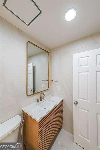 503 Rising Dr, Woodstock, GA 30189 - bathroom with vanity and tile patterned flooring
