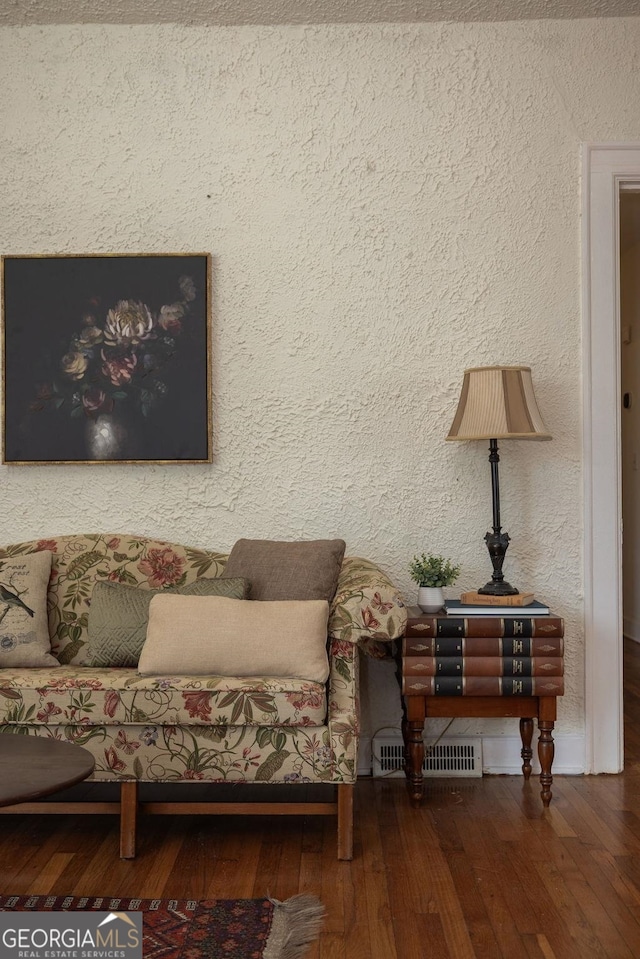 204 S Jefferson Ave, Eatonton, GA 31024 - living area featuring hardwood / wood-style floors and baseboards