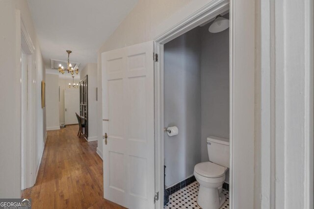 204 S Jefferson Ave, Eatonton, GA 31024 - bathroom with a chandelier and lofted ceiling