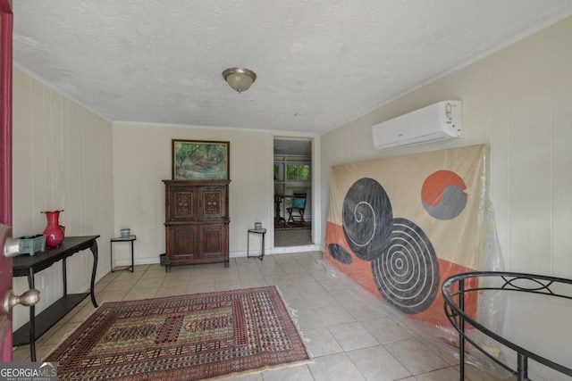 204 S Jefferson Ave, Eatonton, GA 31024 - entrance foyer with a wall mounted air conditioner, tile patterned flooring, and wooden walls