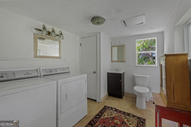204 S Jefferson Ave, Eatonton, GA 31024 - laundry area featuring separate washer and dryer