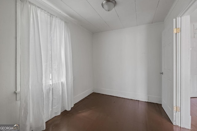 204 S Jefferson Ave, Eatonton, GA 31024 - unfurnished room featuring hardwood / wood-style flooring and baseboards