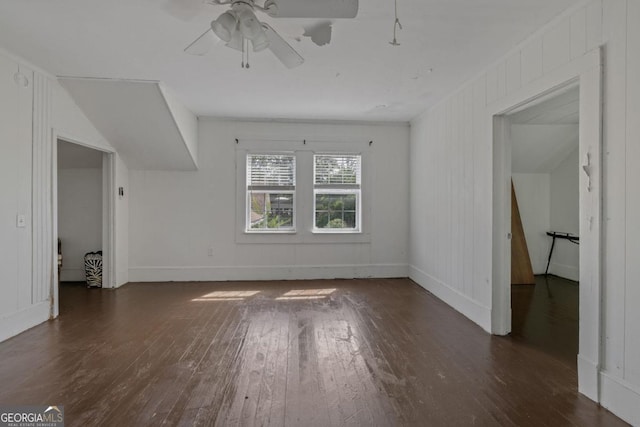 204 S Jefferson Ave, Eatonton, GA 31024 - unfurnished living room featuring hardwood / wood-style floors and a ceiling fan