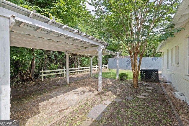 204 S Jefferson Ave, Eatonton, GA 31024 - view of yard with a pergola