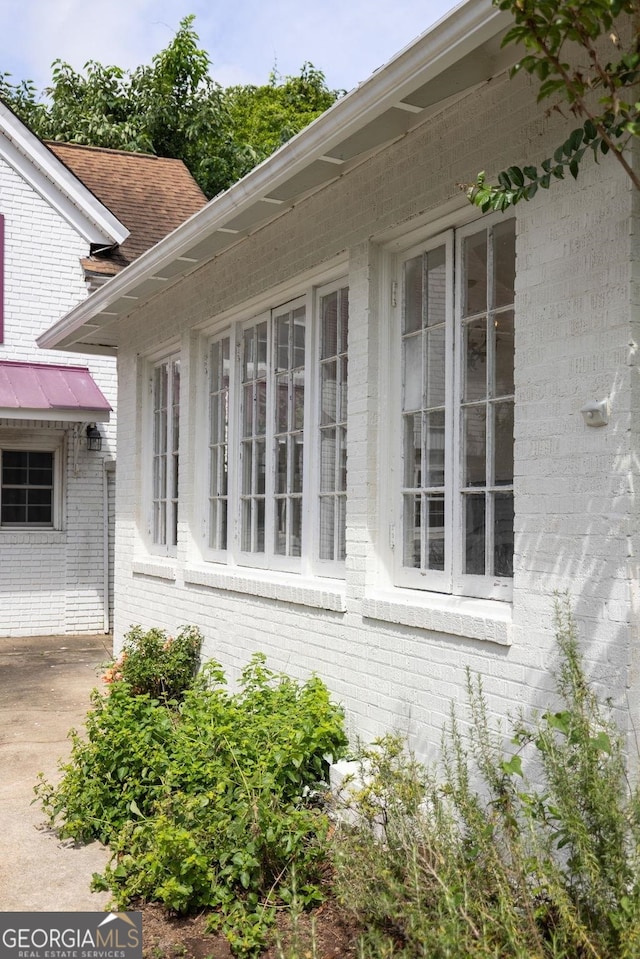 204 S Jefferson Ave, Eatonton, GA 31024 - view of property exterior with brick siding