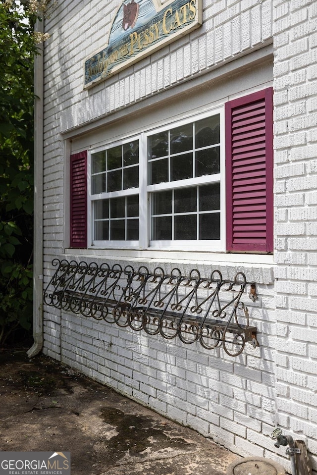 204 S Jefferson Ave, Eatonton, GA 31024 - view of home's exterior with brick siding