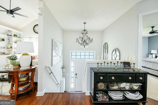 3024 Saddle Creek Dr, Gainesville, GA 30507 - foyer entrance with a ceiling fan, wood finished floors, and a chandelier