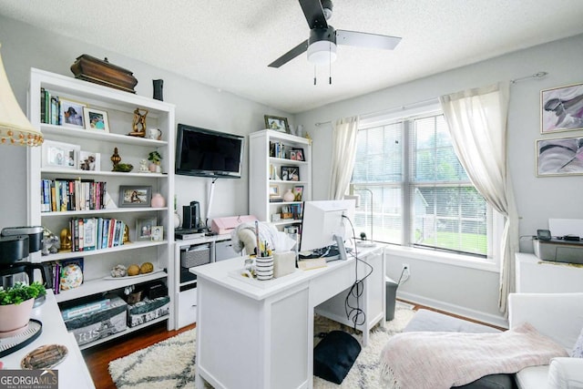 3024 Saddle Creek Dr, Gainesville, GA 30507 - office with wood finished floors, ceiling fan, and a textured ceiling