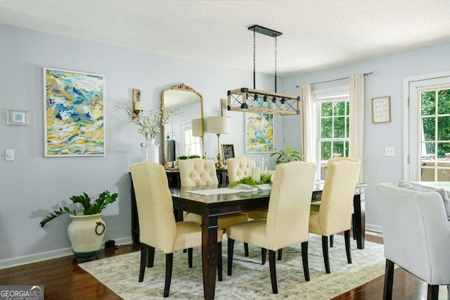 3024 Saddle Creek Dr, Gainesville, GA 30507 - dining area featuring wood finished floors and a textured ceiling