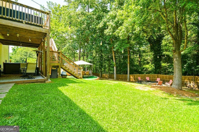 3024 Saddle Creek Dr, Gainesville, GA 30507 - fenced yard with stairs, an outdoor fire pit, a deck, and a patio area