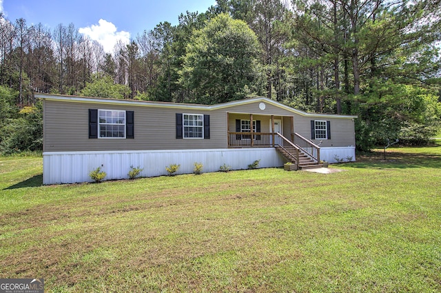 1525 Bailey Rd, Aragon, GA 30104 - manufactured / mobile home with covered porch and a front lawn