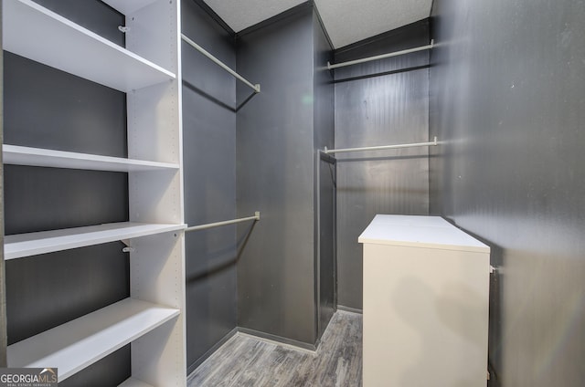 1525 Bailey Rd, Aragon, GA 30104 - walk in closet featuring wood finished floors