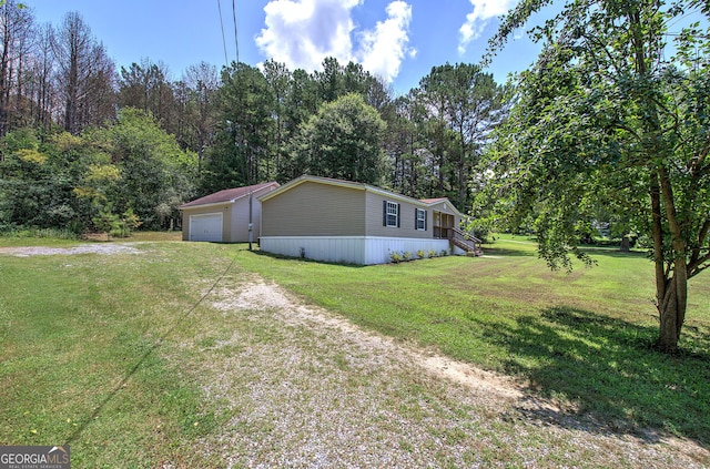 1525 Bailey Rd, Aragon, GA 30104 - view of home's exterior with a yard, driveway, and a detached garage