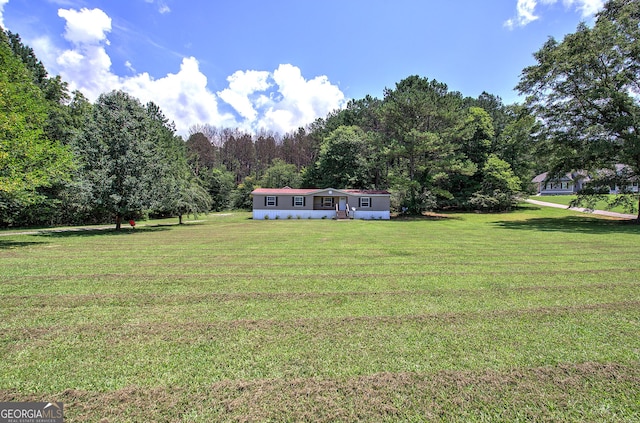 1525 Bailey Rd, Aragon, GA 30104 - view of grassy yard featuring a forest view
