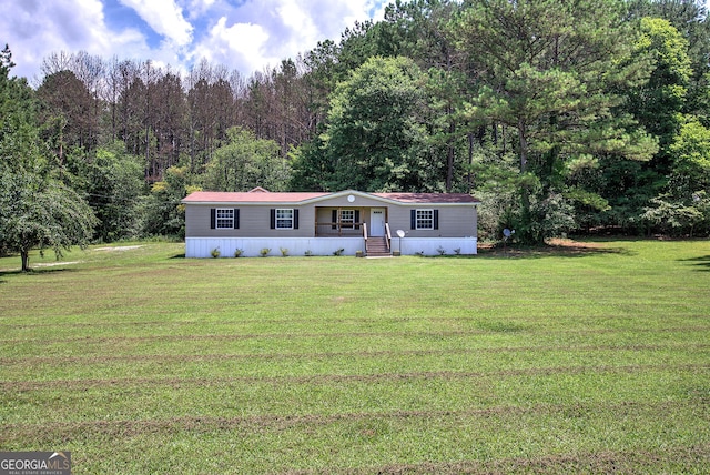 1525 Bailey Rd, Aragon, GA 30104 - manufactured / mobile home with a front lawn and a view of trees