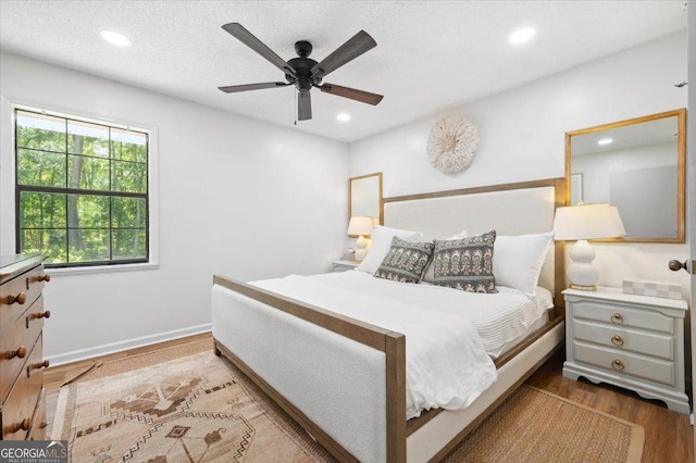 711 Chapman St, Blackshear, GA 31516 - bedroom featuring wood finished floors, recessed lighting, and a ceiling fan