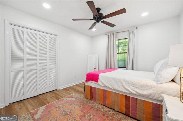 711 Chapman St, Blackshear, GA 31516 - bedroom featuring wood finished floors, recessed lighting, a closet, and ceiling fan