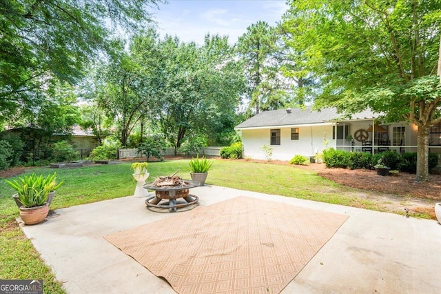 711 Chapman St, Blackshear, GA 31516 - view of patio / terrace featuring a fire pit