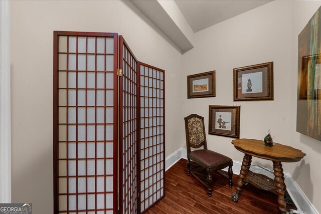 932 Shadowford Fls, Lithonia, GA 30058 - living area featuring dark wood-style flooring and baseboards