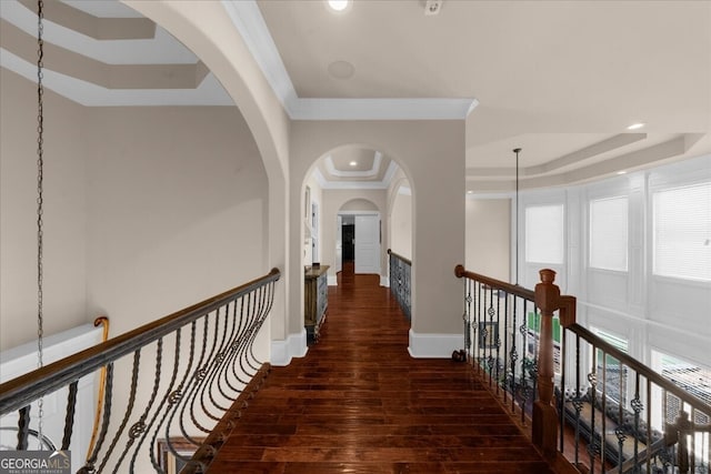 932 Shadowford Fls, Lithonia, GA 30058 - hallway with a tray ceiling, wood-type flooring, ornamental molding, recessed lighting, and arched walkways